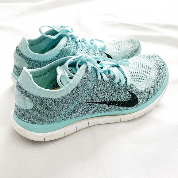 Nike Shoes - Nike Blue Flyknit Nike Free 4.0 Sneakers